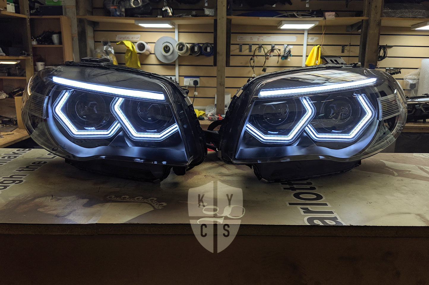 Headlight options on the above vehicle: BavGruppe Design (white) angel eyes | Modern blackout | Bi-LED 2.5" projector with LED bulb | Move high beam to low beam bi-LED projector | High beam dummy projector | Upgraded eyebrow (switchback) | LED indicators